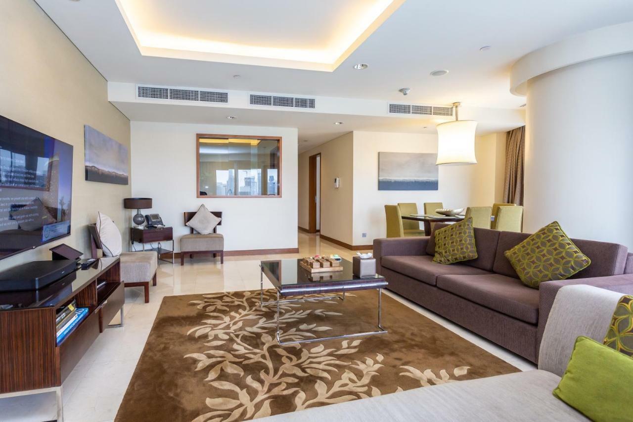 Westminster Dubai Mall Extérieur photo A living room in a typical apartment
